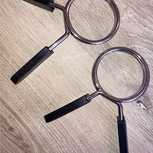 Black and Silver Olympia Weight Clamps